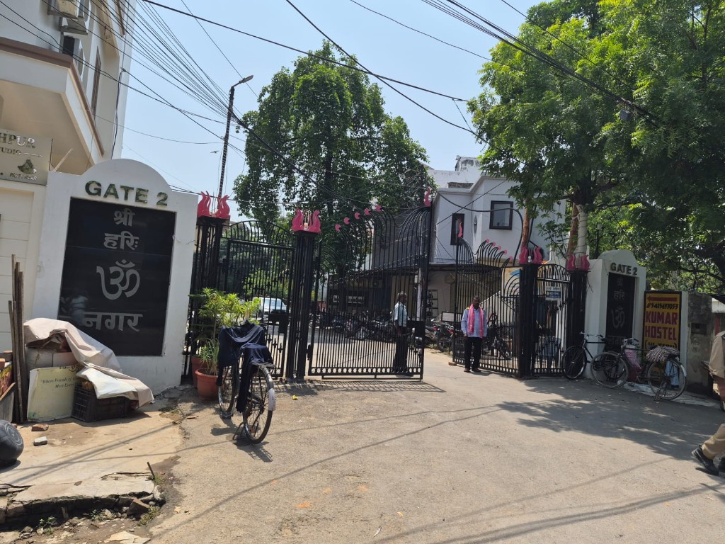 Gate 2 entrance with Kumar Hostel signboard in Gorakhpur